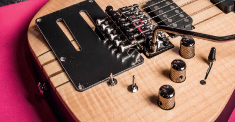 Comment remplacer les cordes d'une guitare électrique ?